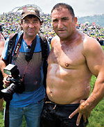 Australian photojournalist Tom Wyness with legendary Turkish oil wrestler Ahmet Tasci